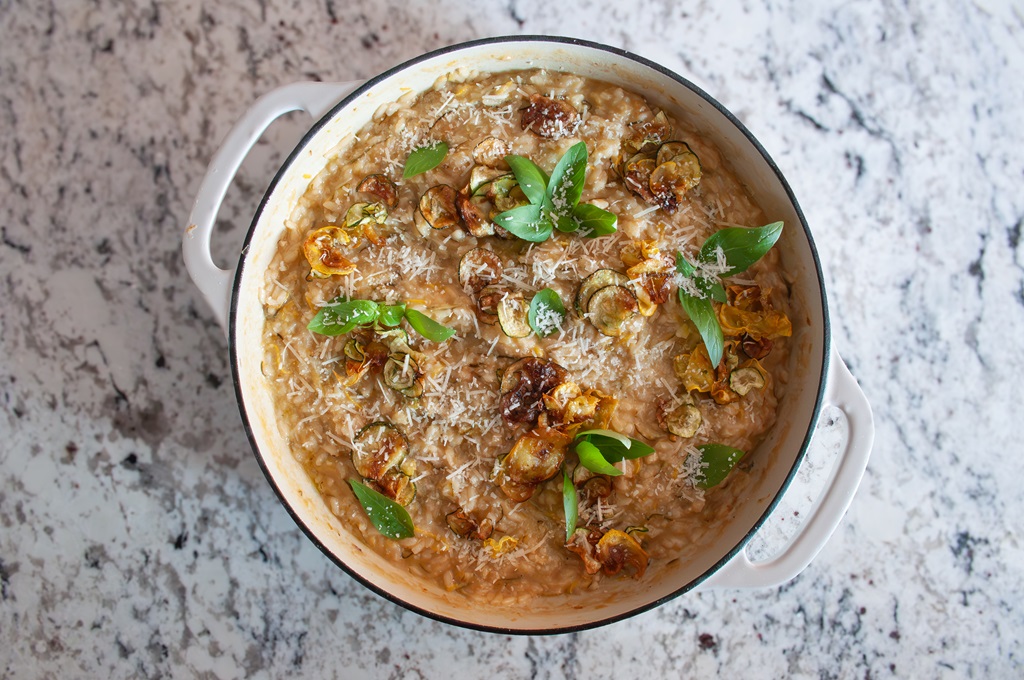 finished casserole with risotto on white speckled background