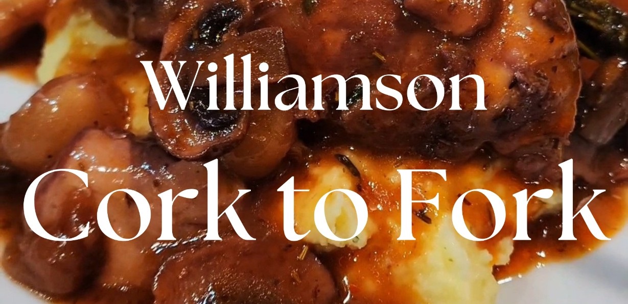 Williamson Cork to Fork words layered over picture of mashed potatoes and stewed meat and veg